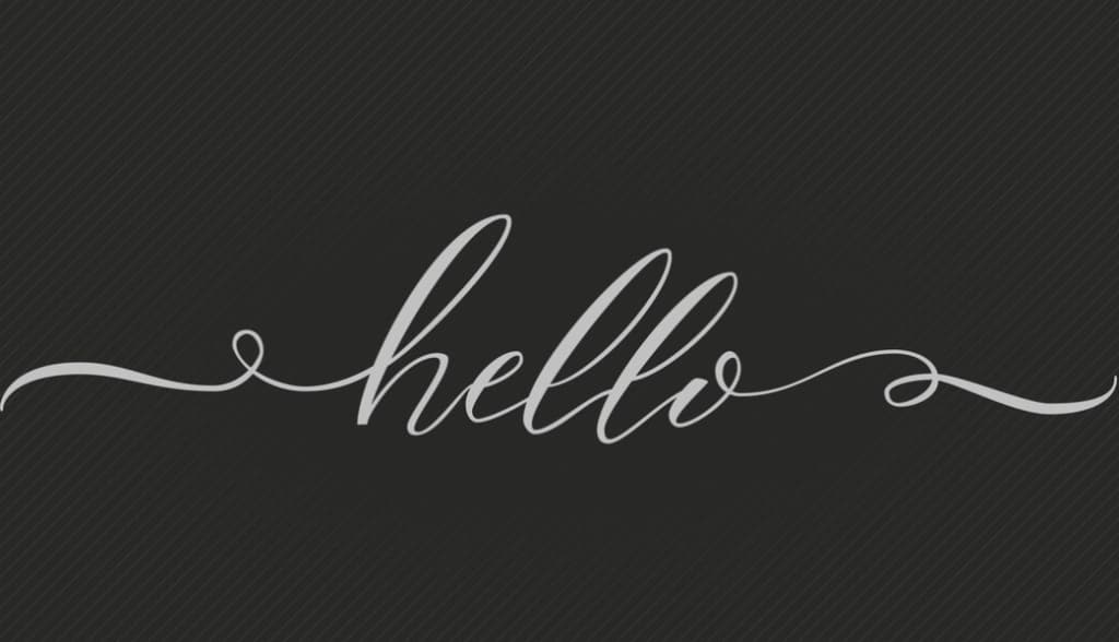 "hello" in cursive script font on a dark textured background