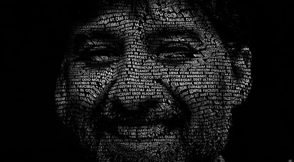 Man's face made from text