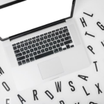 Various Alphabets Around Laptop